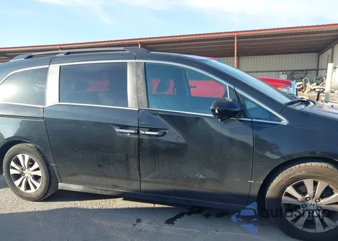 2014 Honda Odyssey Ex-L z USA, uszkodzony, nr VIN 5FNRL5H63EB068452